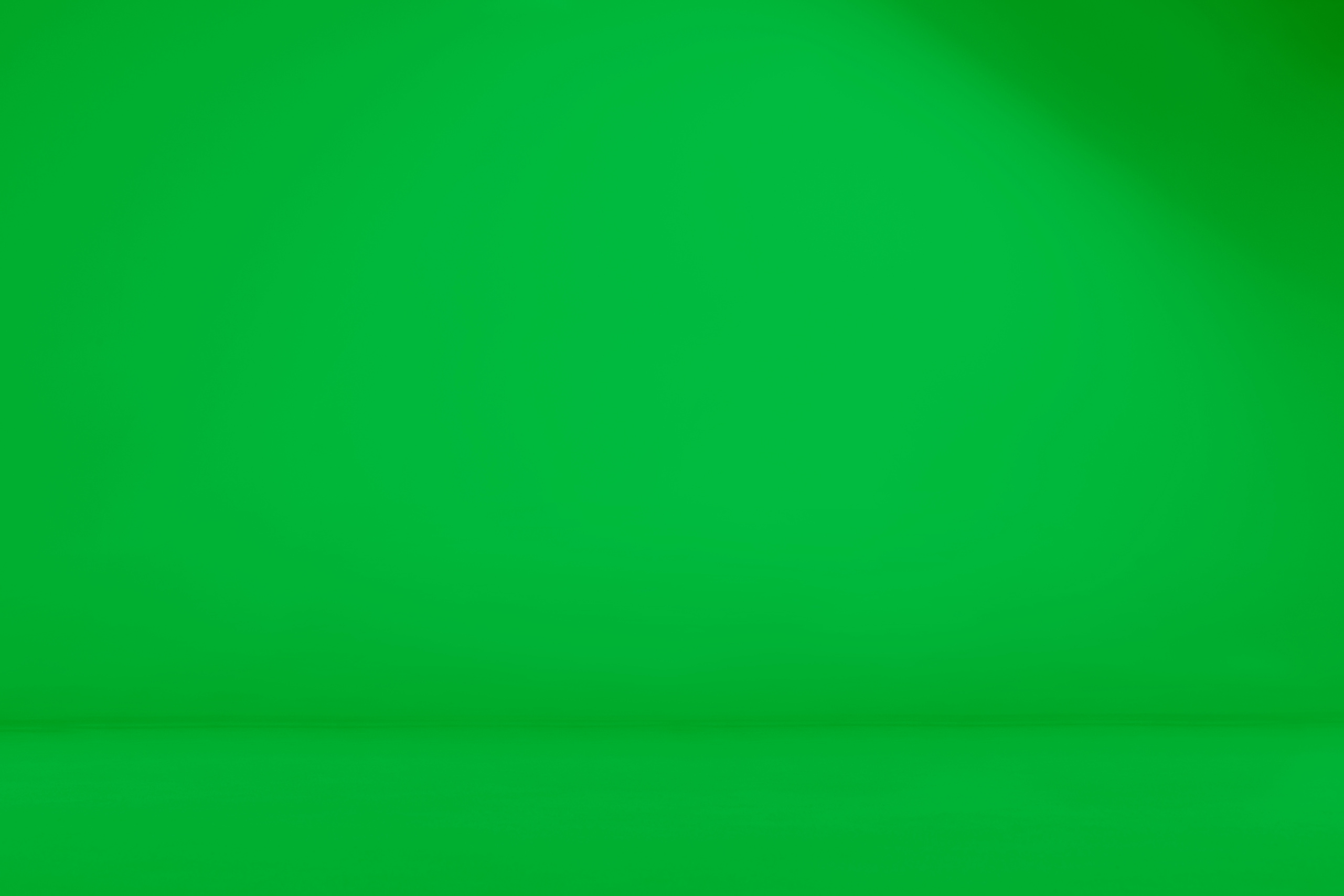 Seamless chroma key, green screen background.